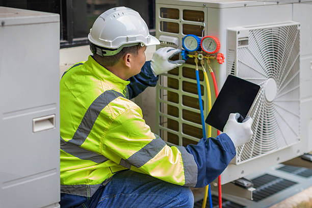Professional Emergency Ac Repair technician working in The Plains, OH